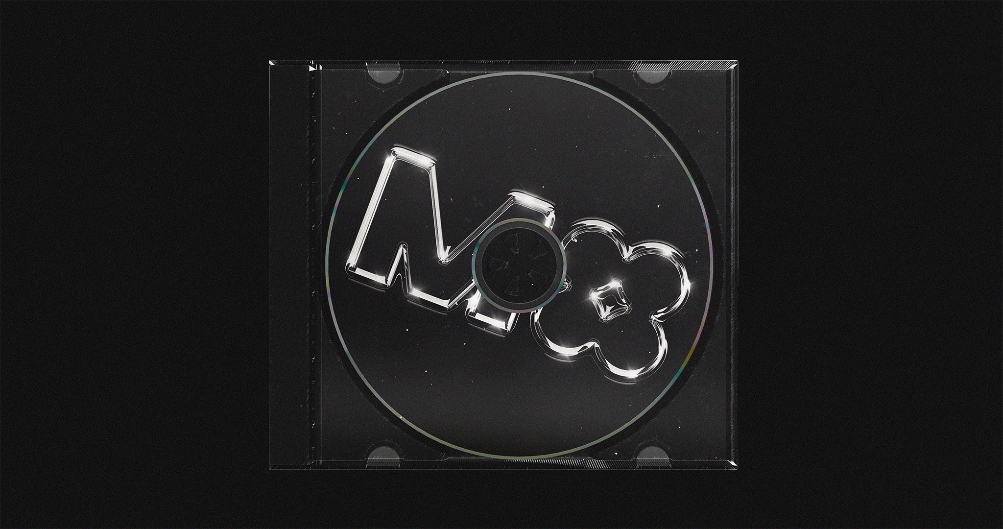 A photographic mockup of a stylized, chrome render of the M4 logotype printed on a compact disc (CD), inside a CD case.