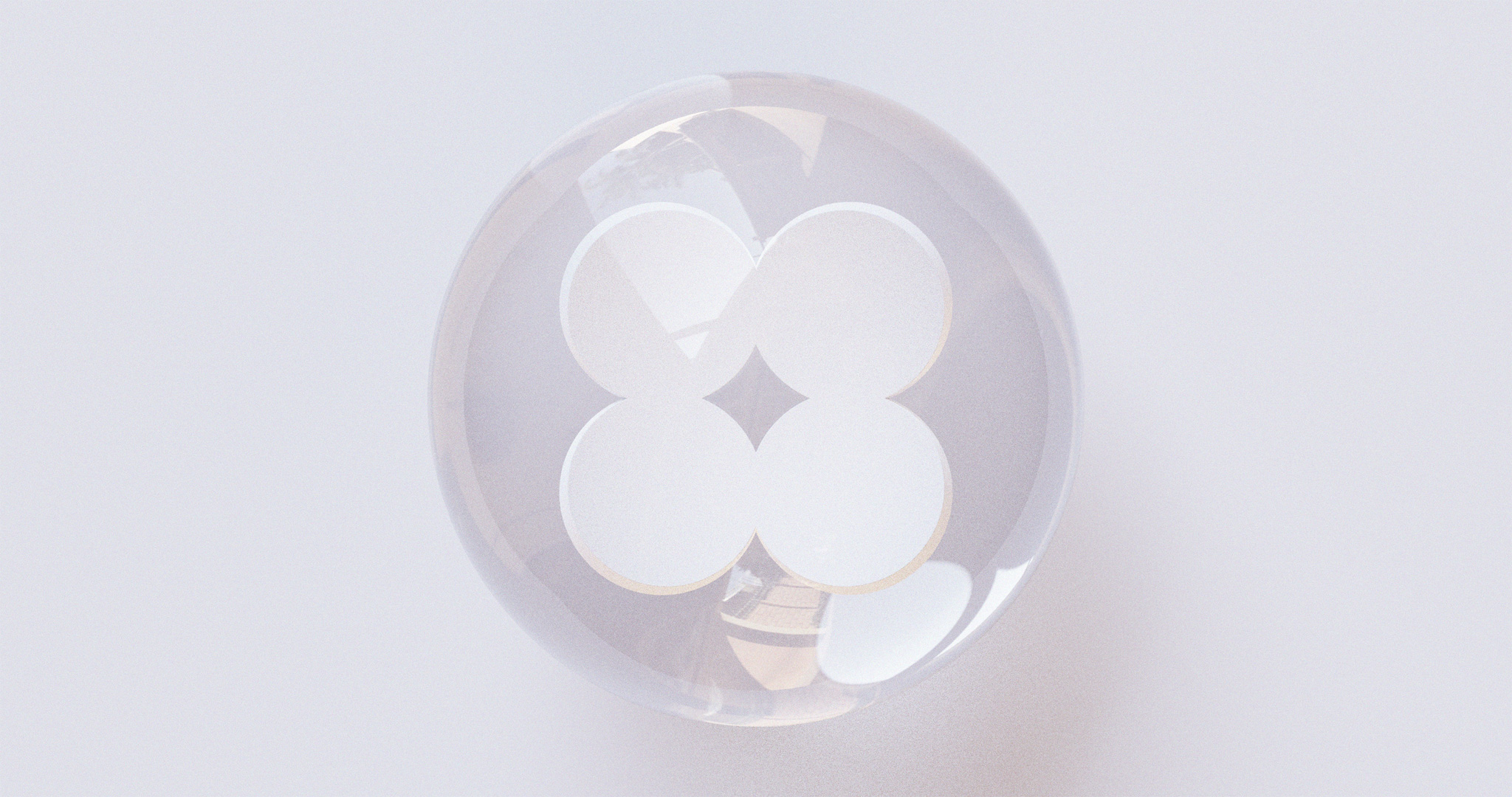 3D render of the ‘M4 icon’, in a white, mineral-like material, enclosed in a transparent glass orb.