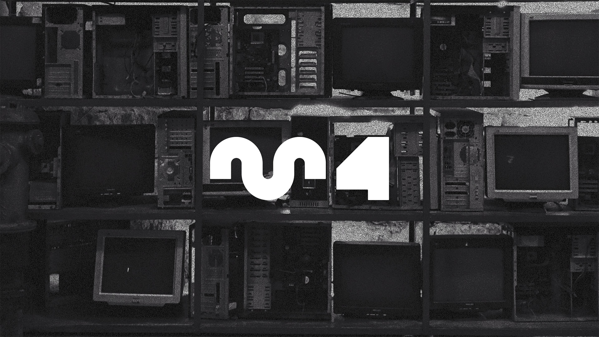 An abstract, symbol-based logomark featuring a one-and-a-half-cycle segment of a sine wave, and an abstract digit ‘4’; laid over a grayscale photograph featuring shelves of vintage electronics and screens.