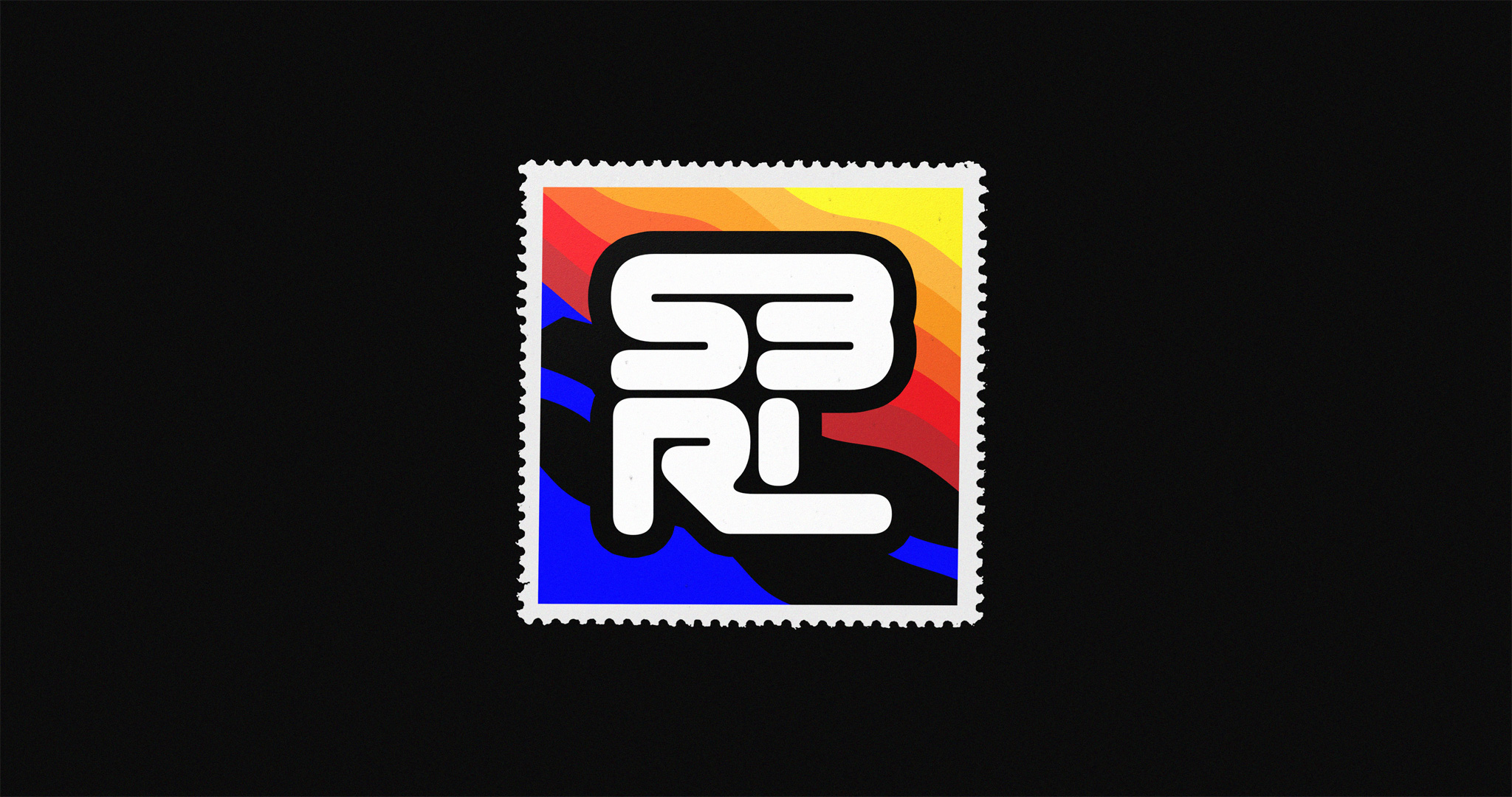 Compact, square version of the S3RL logotype on a brightly colored paper stamp.